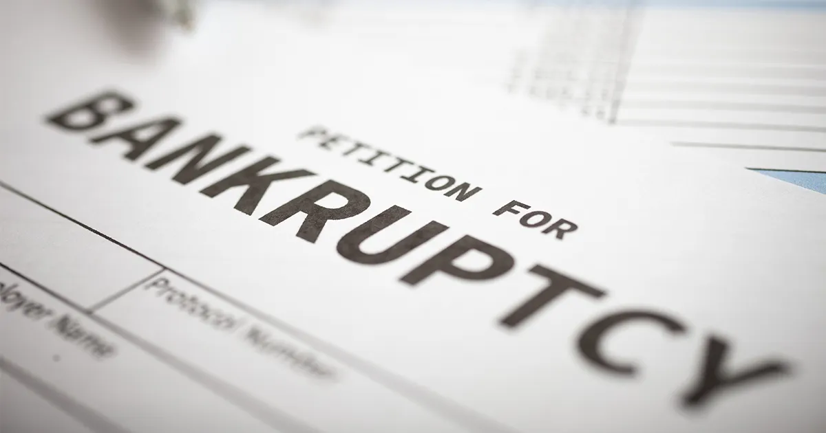 A close-up view of a petition for bankruptcy document.